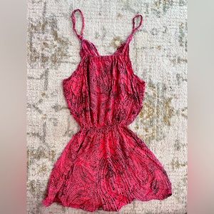 Pink romper with black design